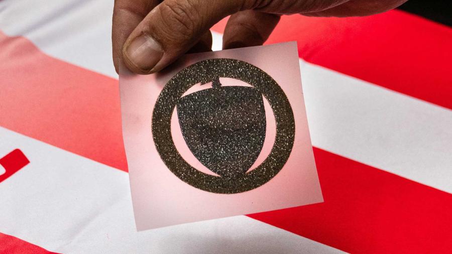 Retro del transfer DTF Subli Shield con colla bianca